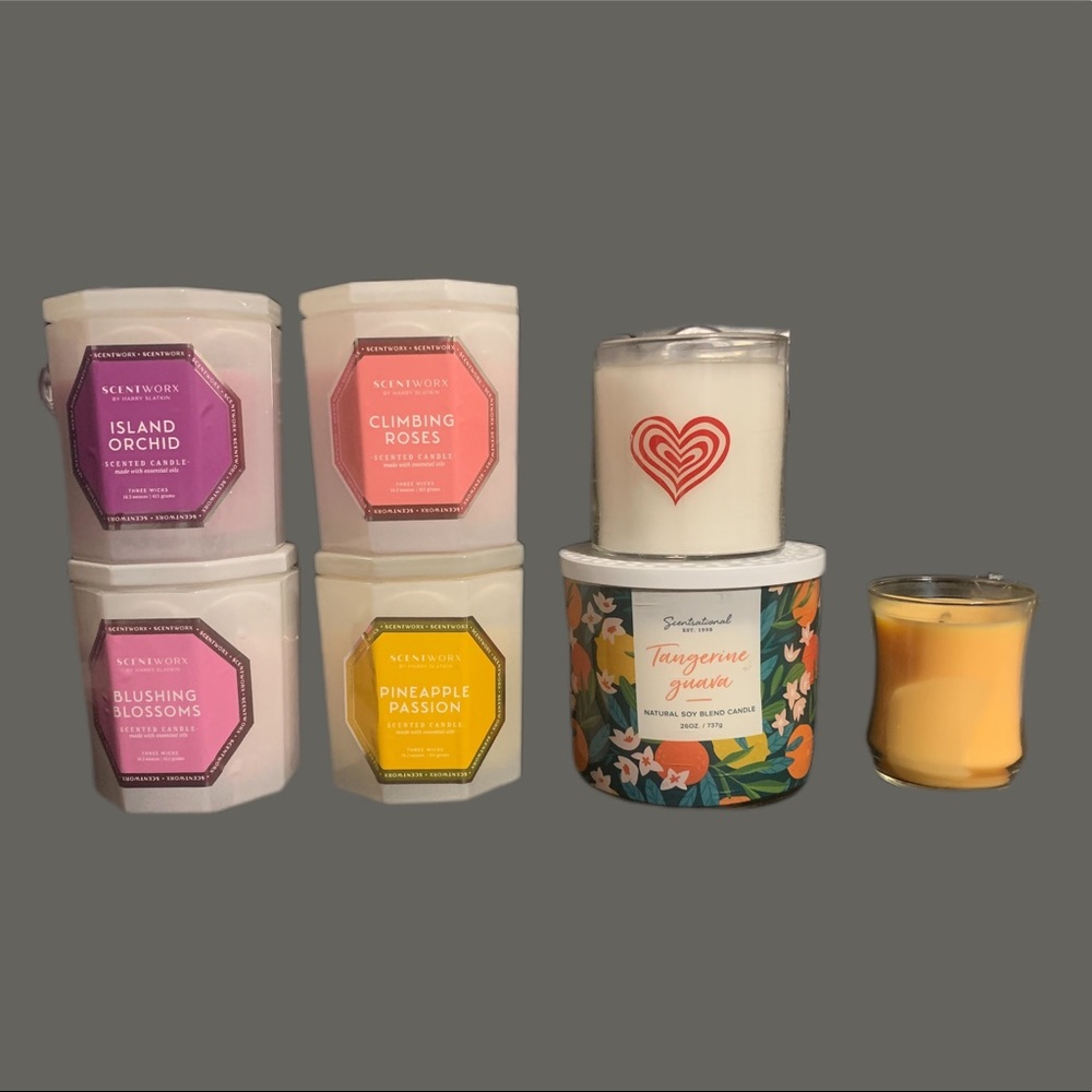 Lot of 7 unburned and slightly burned candles.